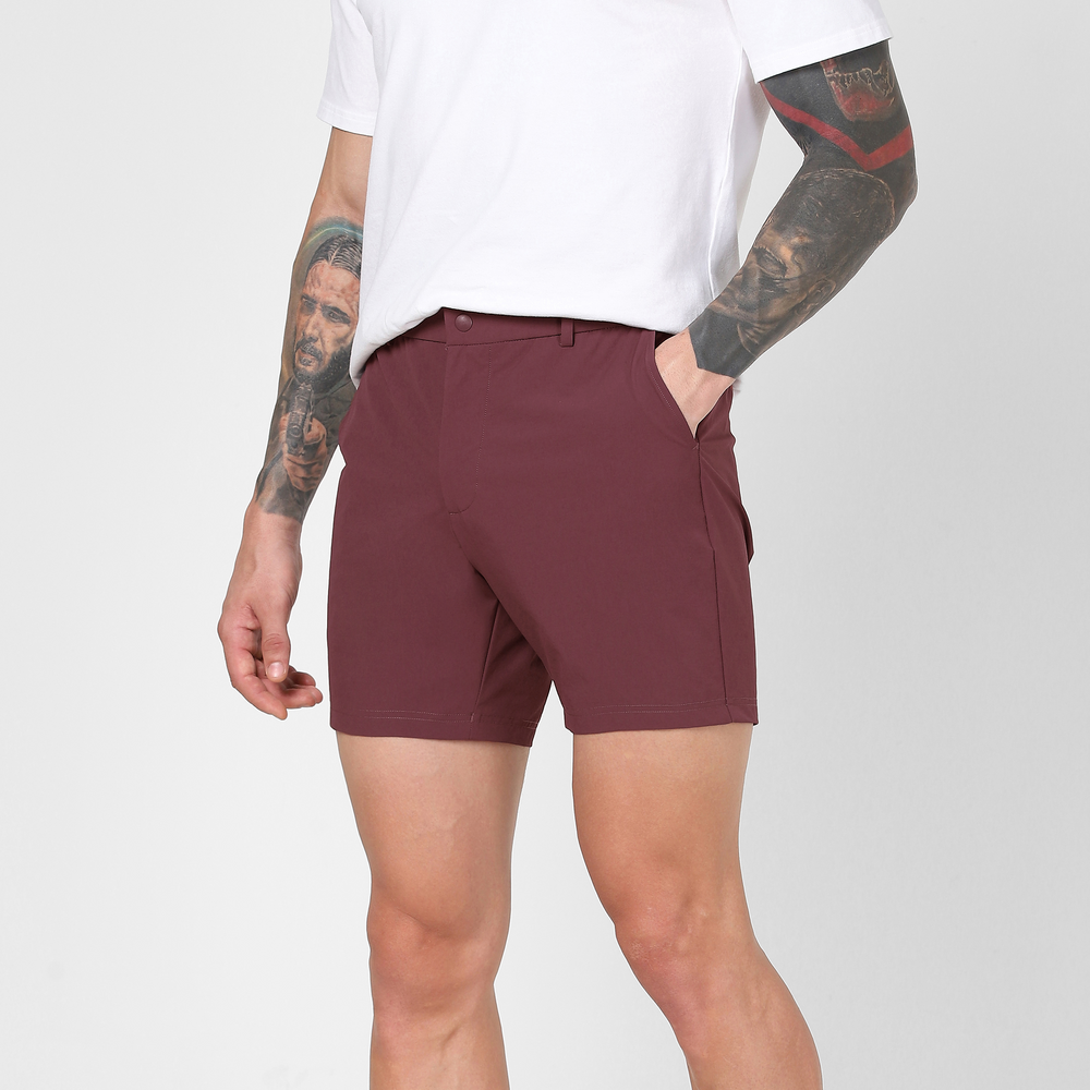 Tour Short 5.5" Wine side on model hand in pocket