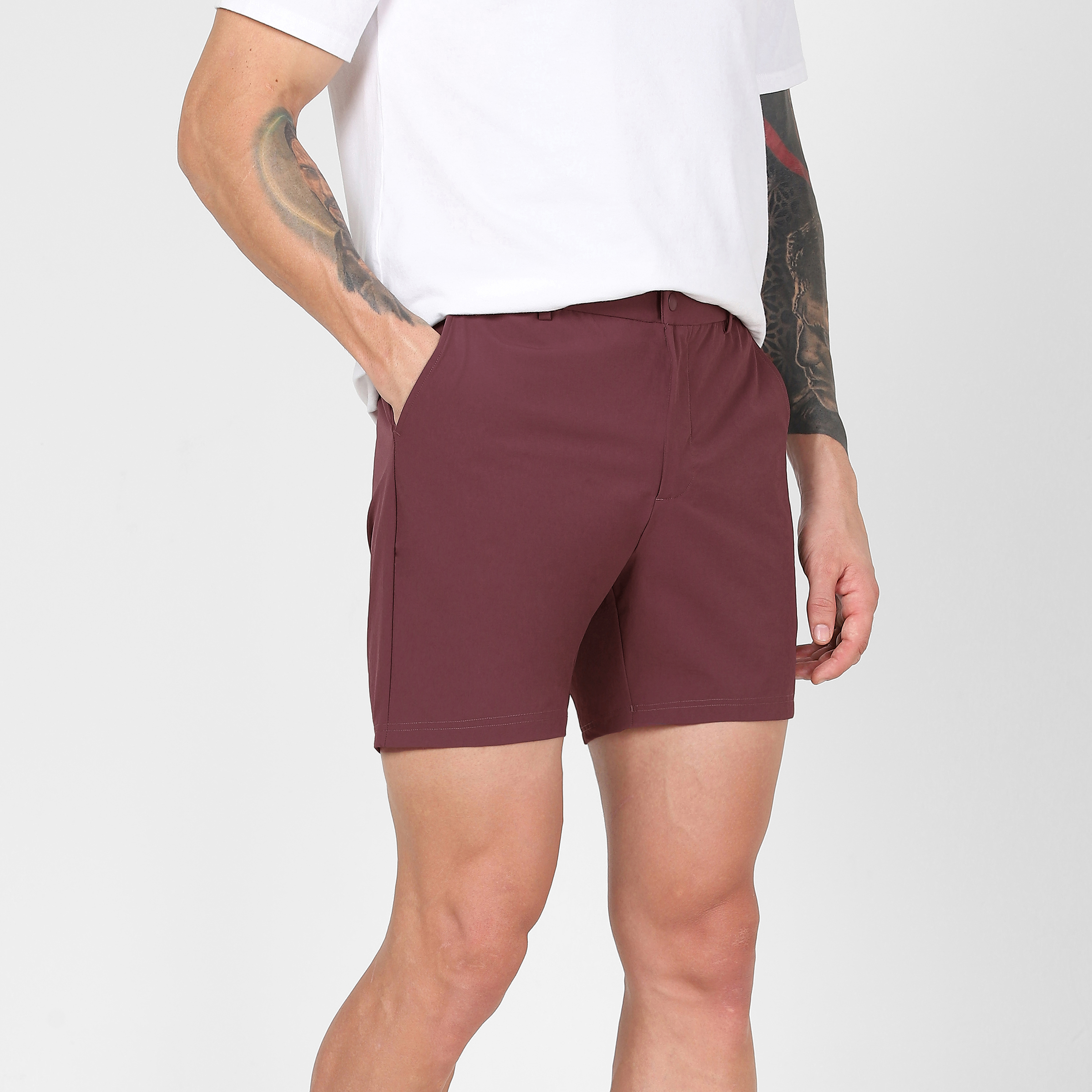 Tour Short 5.5" Wine right side on model hand in pocket