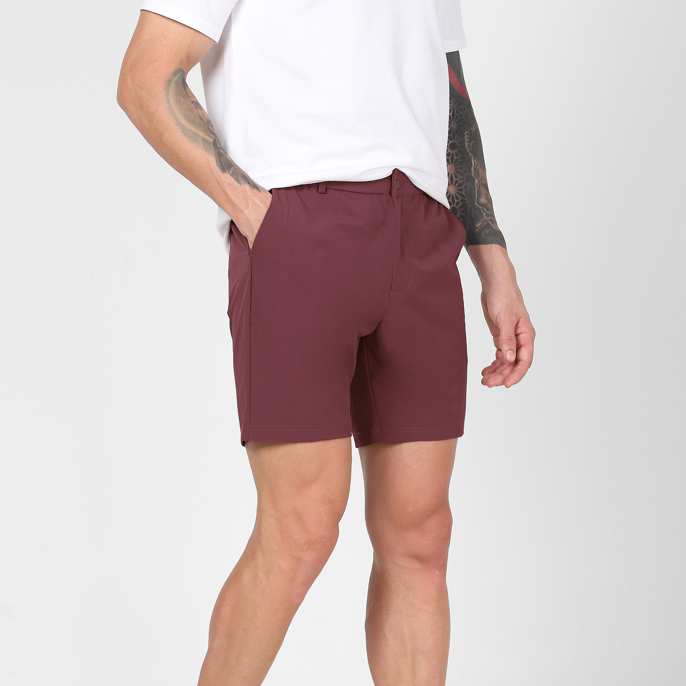 Tour Short 7" Wine front right on model hand in pocket 