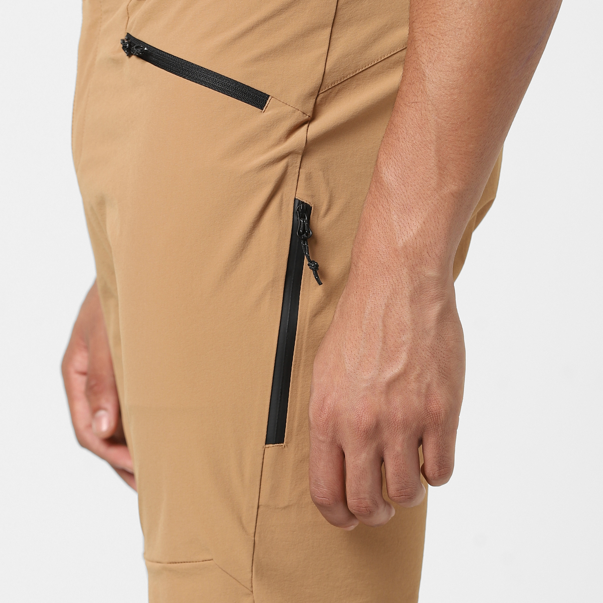 Trail Pant Desert close up perforated side vent pocket