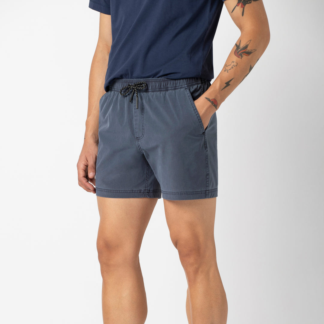 Volley Short 5 Navy side on model