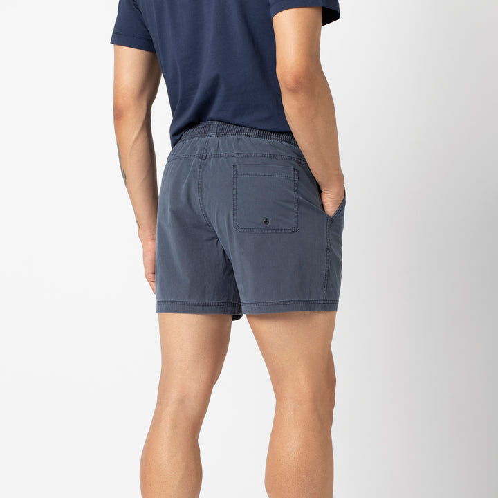 Volley Short 5 Navy back on model