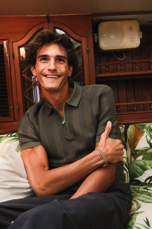 The Zip Sweater Polo in Alpine showing the quarter-zip ladder texture