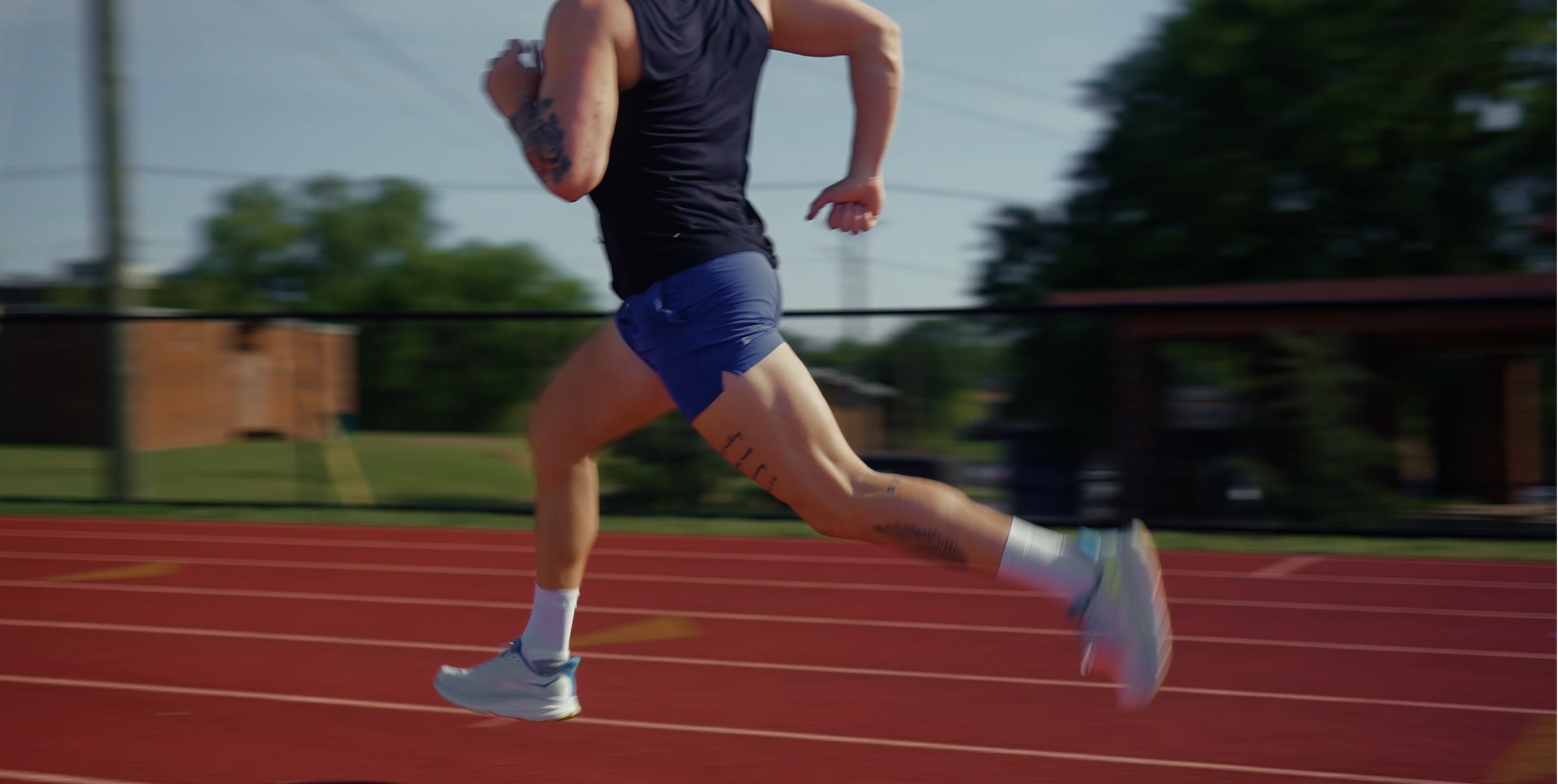 Model running on track with Field Short (Lined) Field Blue