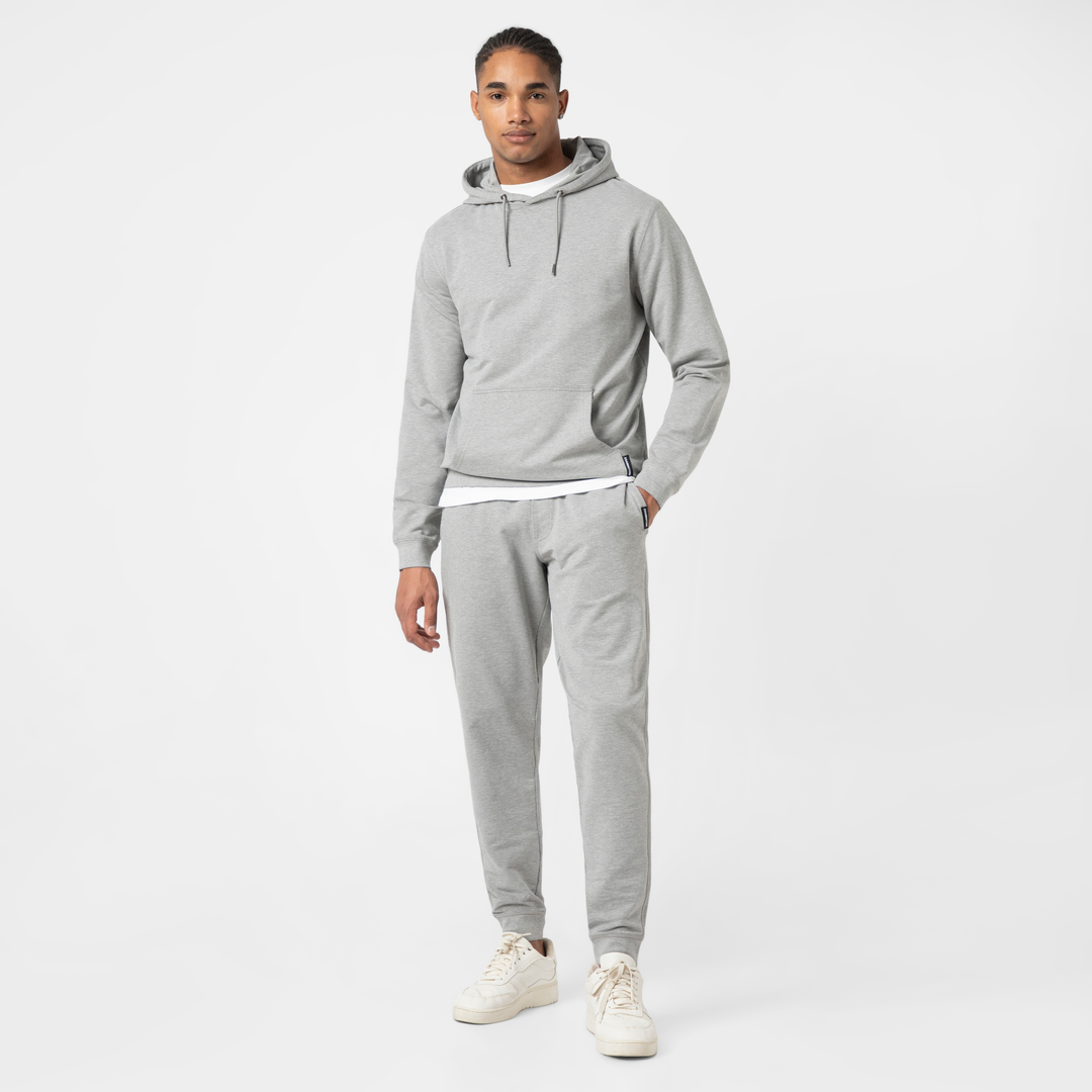 Lounge Jogger Heather Grey full body on model with Lounge Hoodie Heather Grey