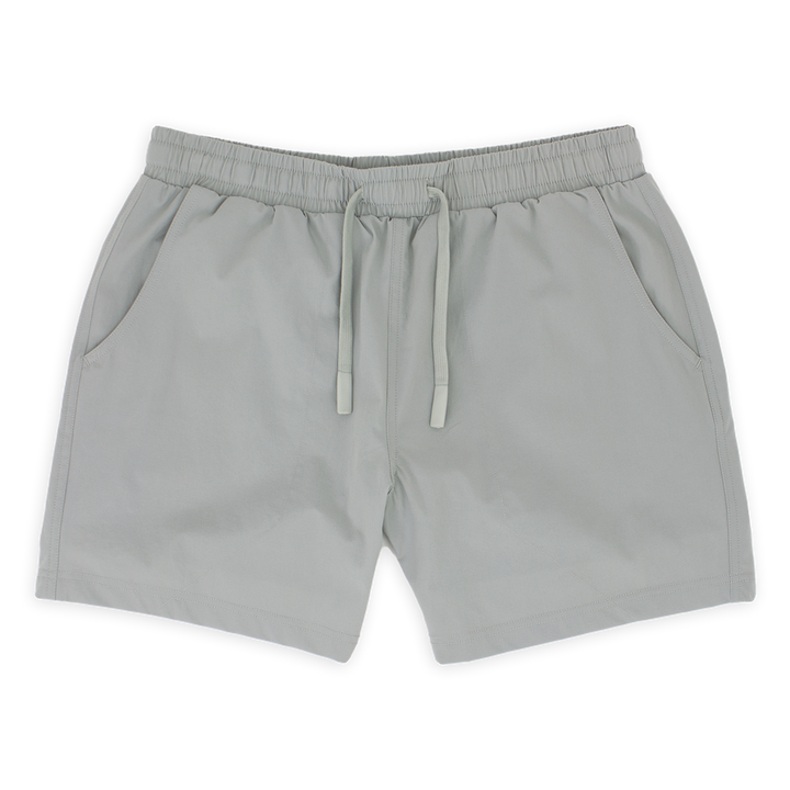 Base Short 5.5" Grey front with elastic waistband, dyed-to-match flat drawstring with rubberized tips, and two seam pockets