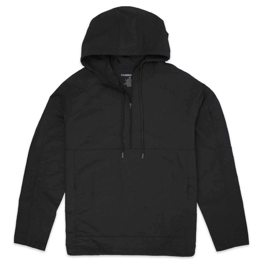 Windbreaker Jacket in Black with kangaroo pocket with zippers, zipper stash pocket on right arm, wrist snaps for secure fit, rubberized hood drawstring, and three-quarter zipper through collar