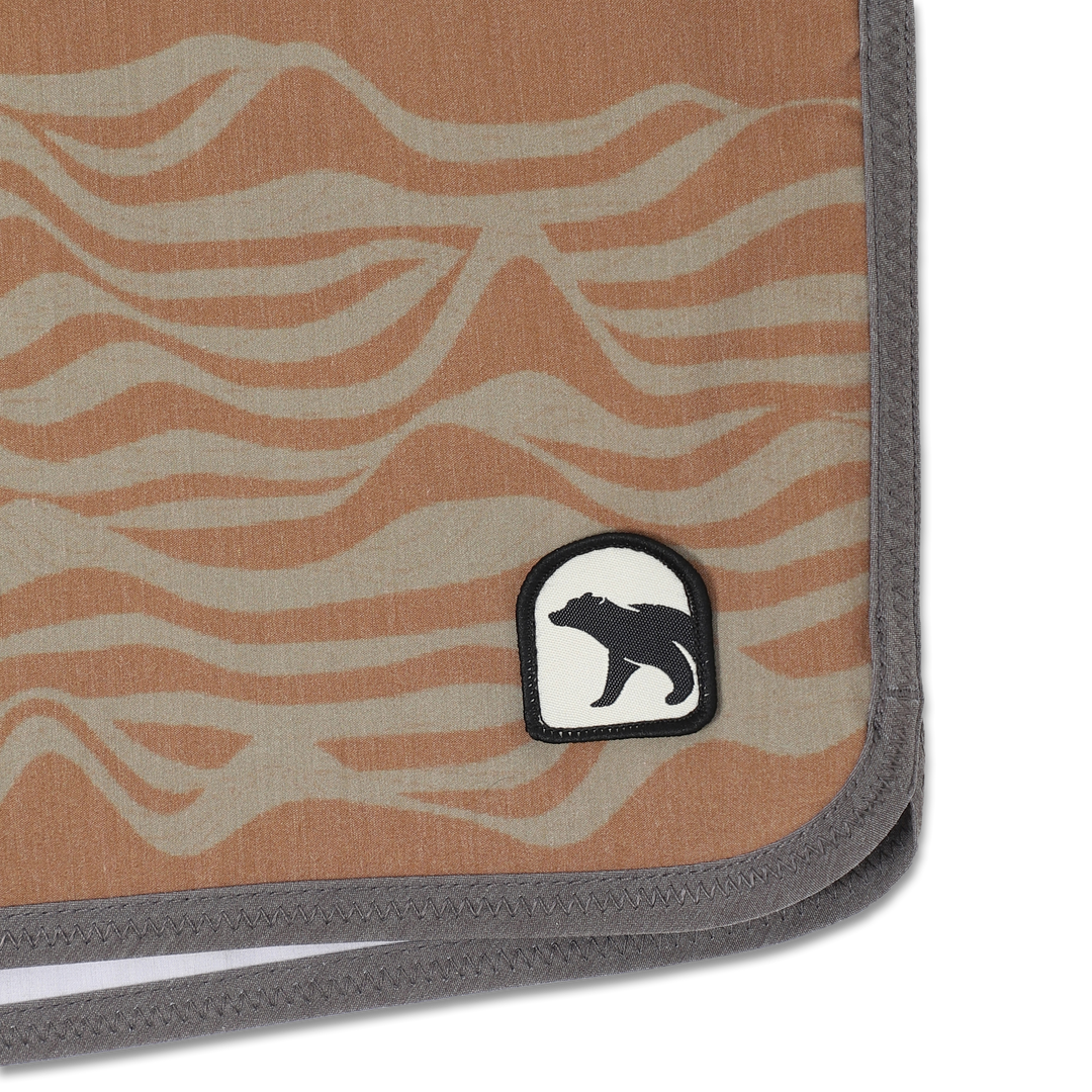Board Short 8" Sahara close up of Bear logo patch 