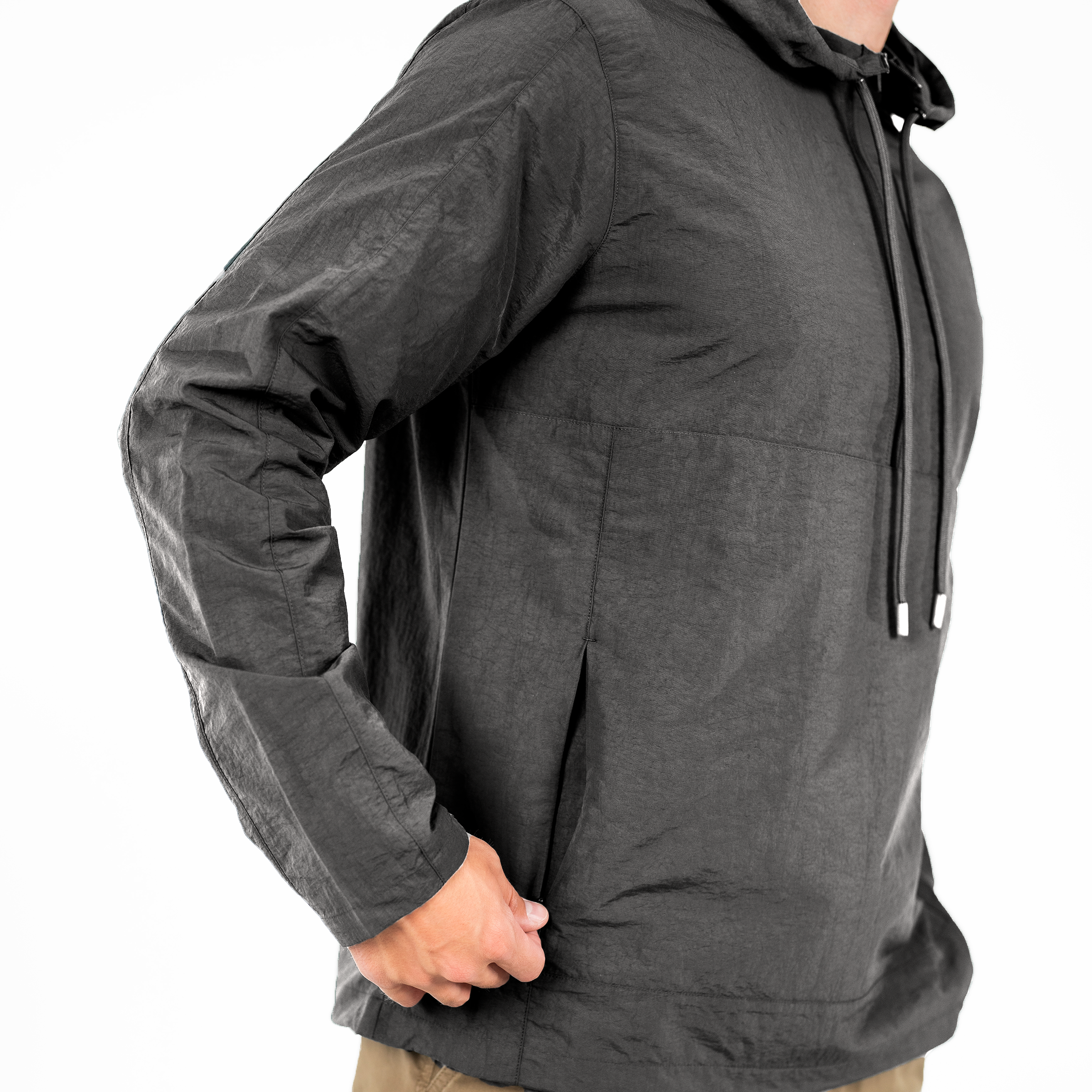 Windbreaker Jacket in Graphite grey on model close up of zipper on kangaroo pocket