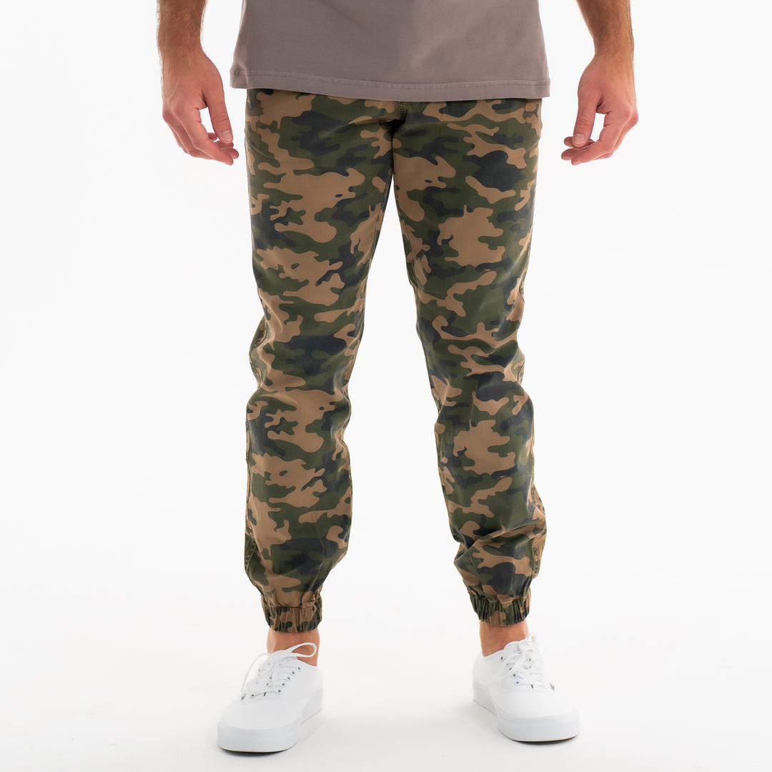 Stretch Jogger Woodland Camo on model with ribbed ankle cuff and two inseam pockets