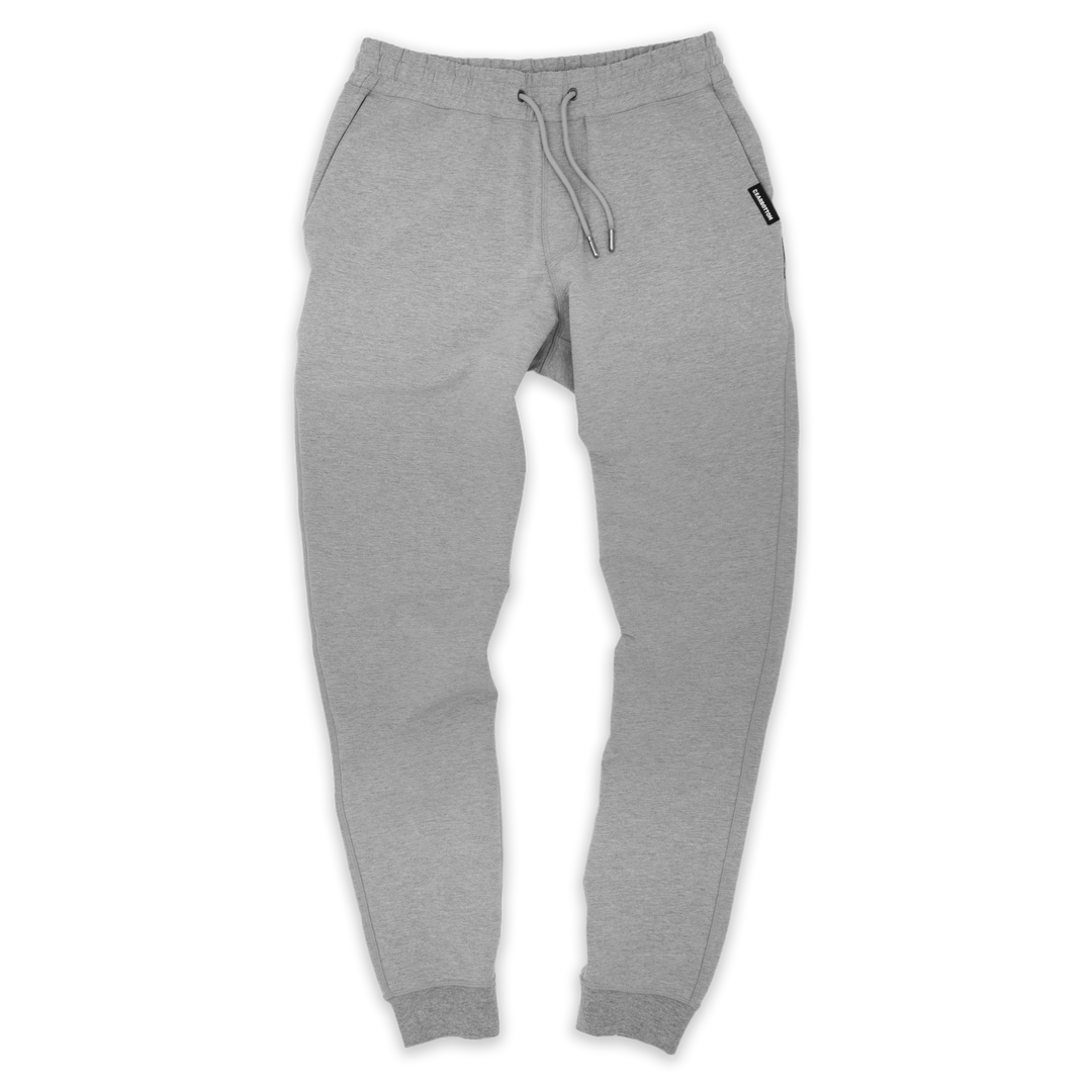 Loft Jogger Heather Grey with elastic waistband, drawstring with metal tips, two inseam pockets, and ribbed ankle cuffs