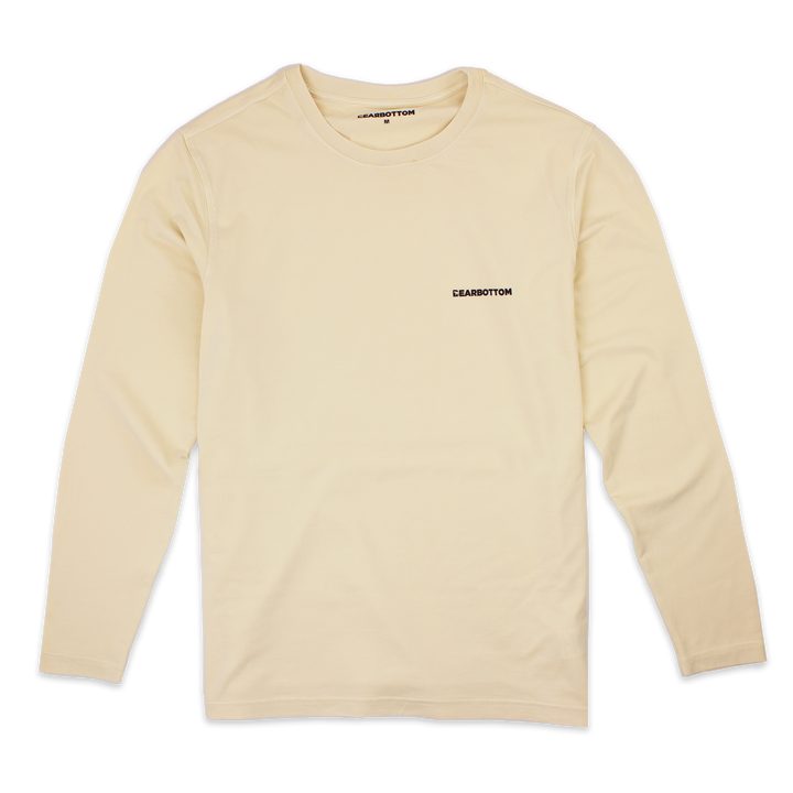 Natural Dye Logo Long Sleeve Tee in Sand yellow with Crewneck and Bearbottom printed in black on front left chest