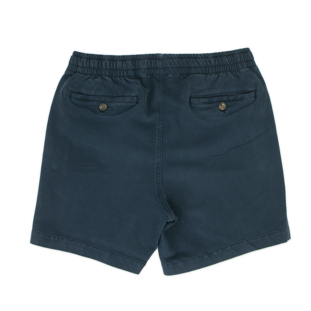 Alto Short 5.5" inseam in Navy back with elastic waistband and two welt pocket with horn buttons
