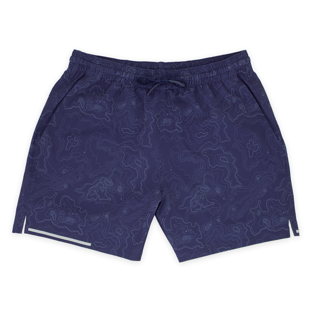 Run Short 5.5" Topography Navy front with elastic waistband, dyed-to-match drawstring with rubberized tips, two front pockets, split hem, and reflective line on bottom right hem