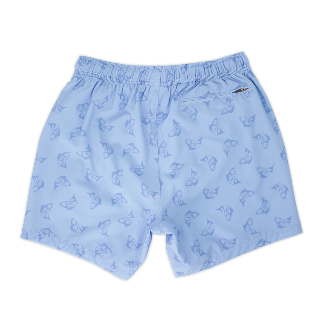 Stretch Swim 5.5" Bonita back, a light periwinkle blue with a print of darker blue sketched fish with an elastic waistband and a back right zippered pocket