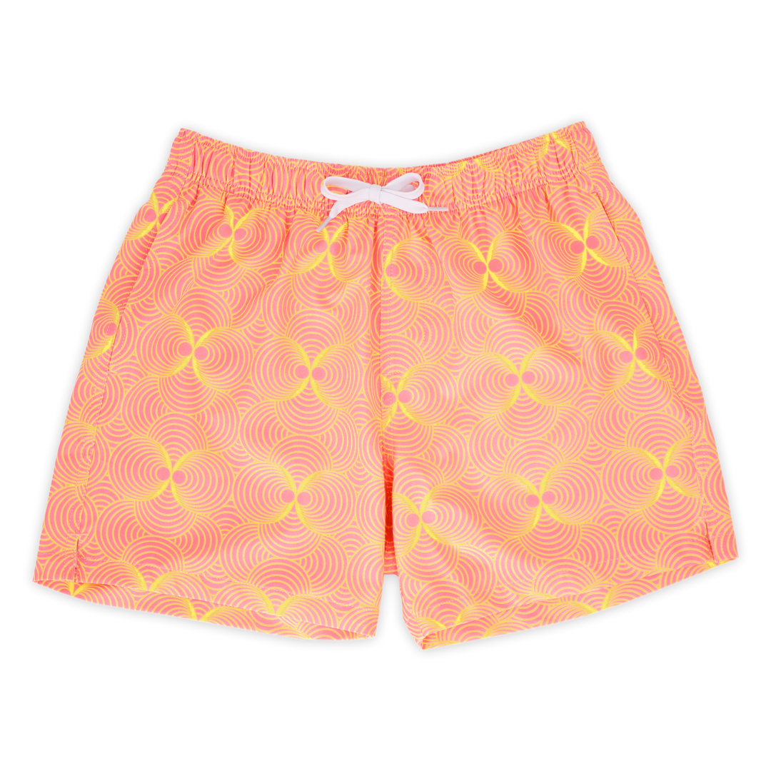 Stretch Swim 5.5" Groovy front, a light pink with bright yellow psychedelic ball shaped pattern with an elastic waistband, two inseam pockets, and a white drawstring
