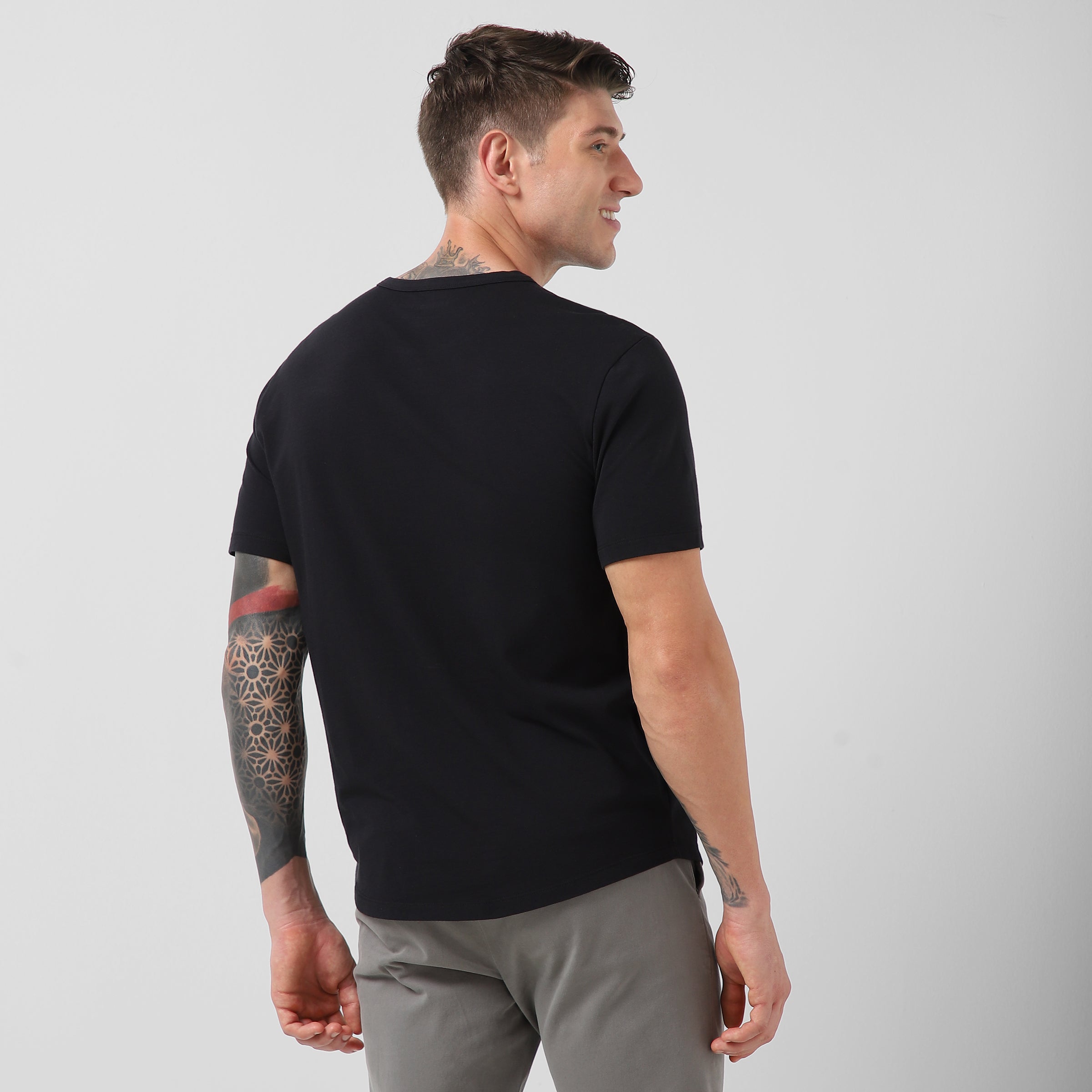 Supima Curved Tee Black back right on model