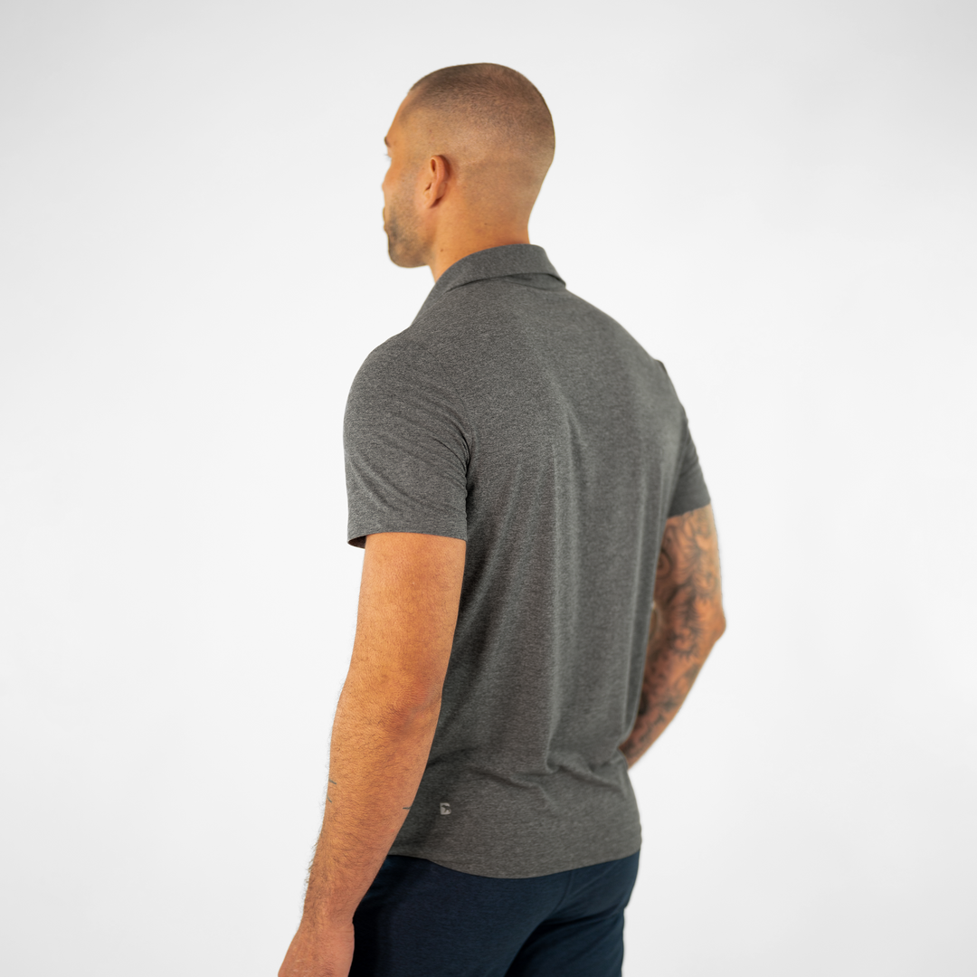 Tech Polo Grey on model paired with Tech Short Navy