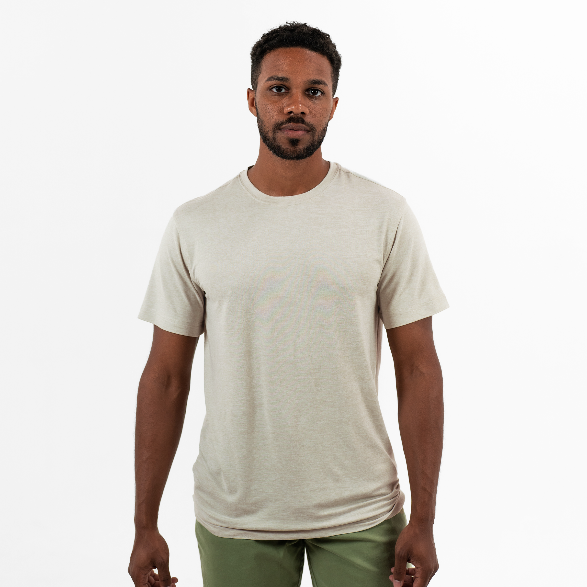 Short Sleeve Tech Tee in Stone front on model with a crew neck and heathered color