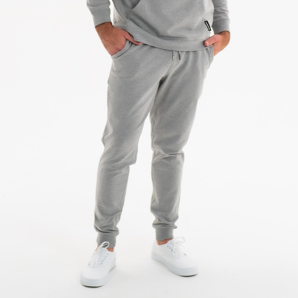 Loft Jogger Heather Grey front on model with hands in pockets